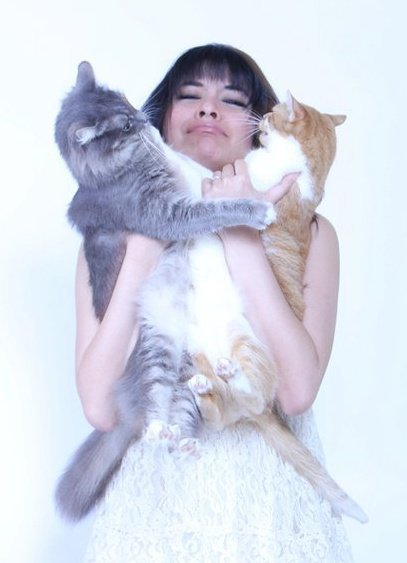 Yasmine Surovec with her cats.