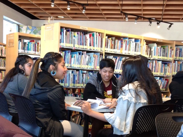 Students from Tohono O’odam High School in the Wildcat Writer’s program engage in a lively discussion.