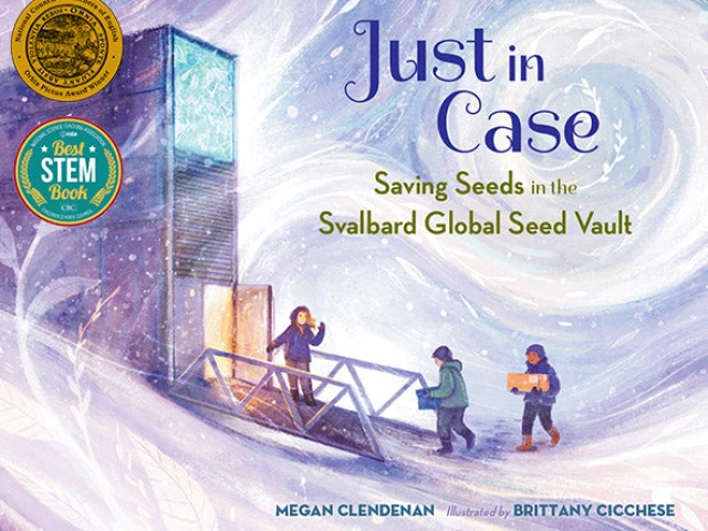 Three people walk through a snowy Arctic landscape to enter a metal building.