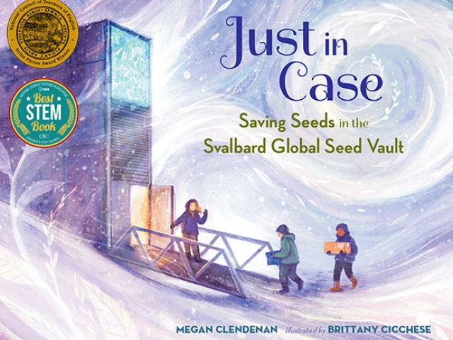 Three people walk through a snowy Arctic landscape to enter a metal building.