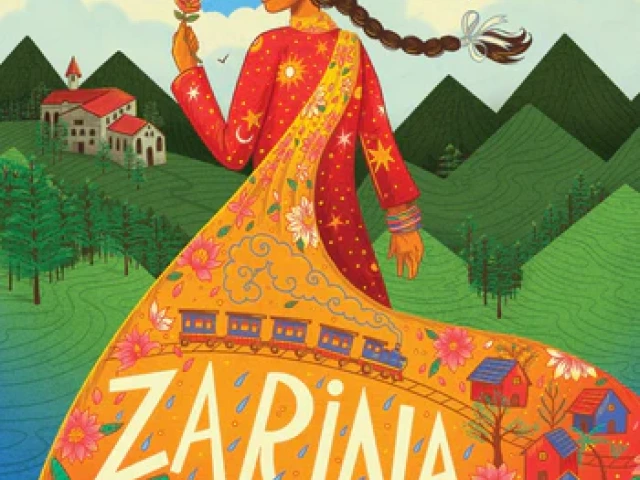 A young Indian Muslim girl in a red dress with a yellow scarf holds a rose. She stands in the water that turns into green mountains in the background.