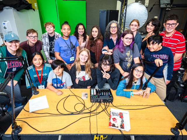 group photo in podcasting studio