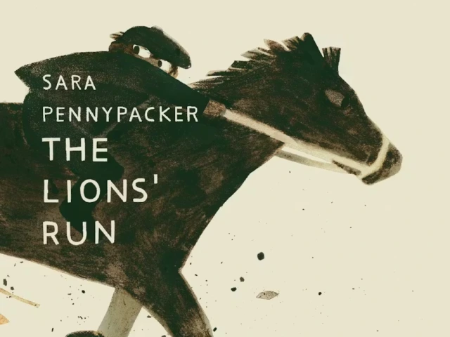 A young boy riding a horse.