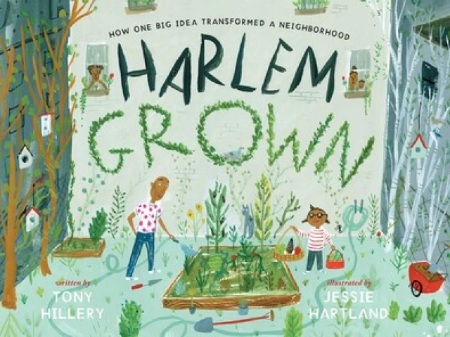An African American man and girl tend to a raised garden bed
