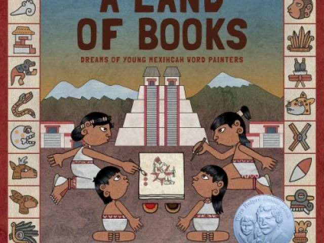 A group of Mexhicah people making a book against the backdrop of a pyramid and snowcapped mountains.