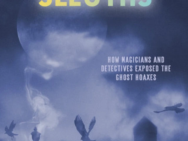 A misty cemetery with a full moon in the background.