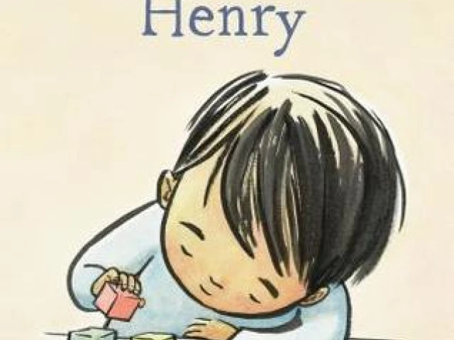 Cover of A Friend For Henry depicting a young boy with black hair playing with colored blocks