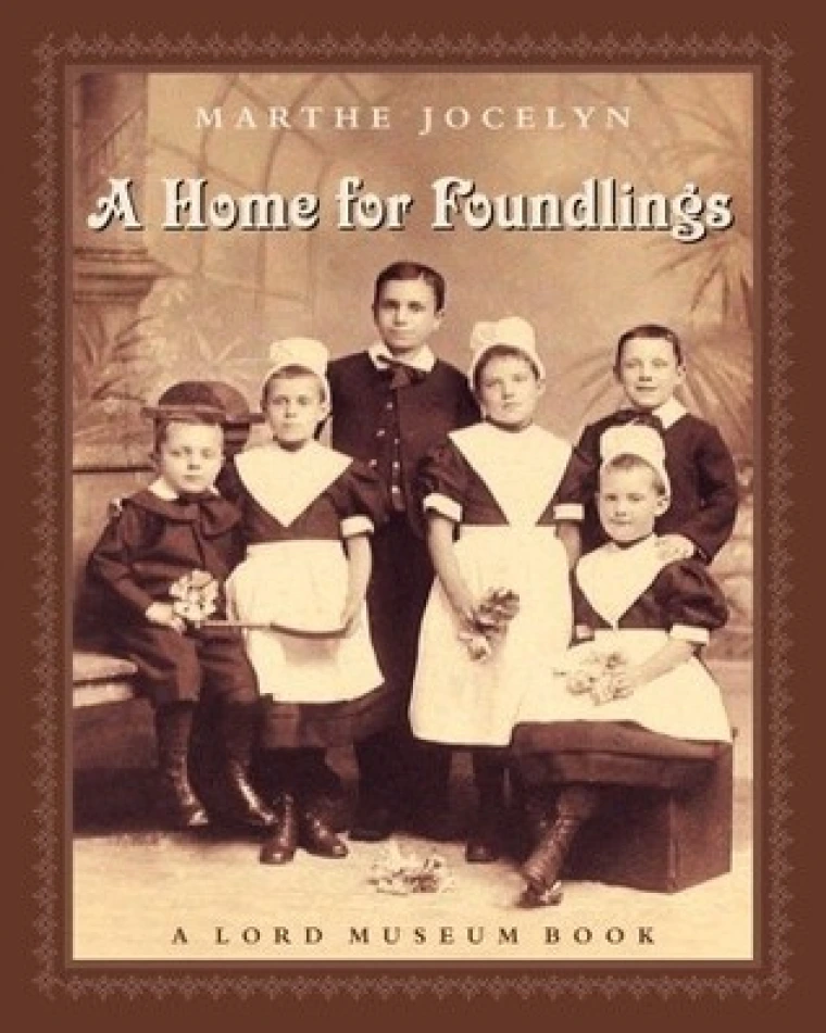 A black and white photo of a group of children.