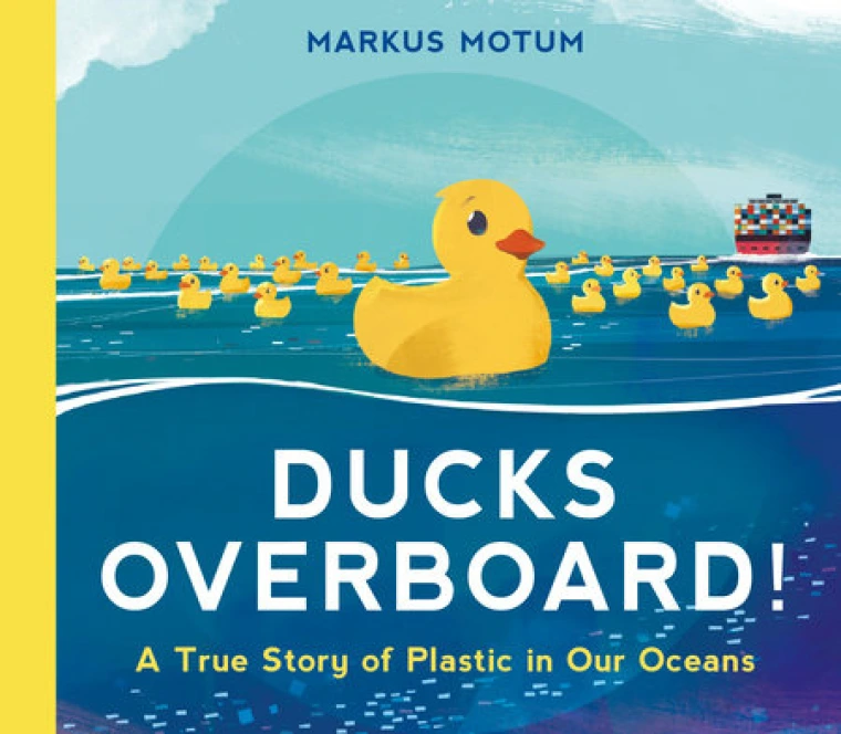 A yellow rubber duck floating in the ocean surrounded by many other rubber ducks.
