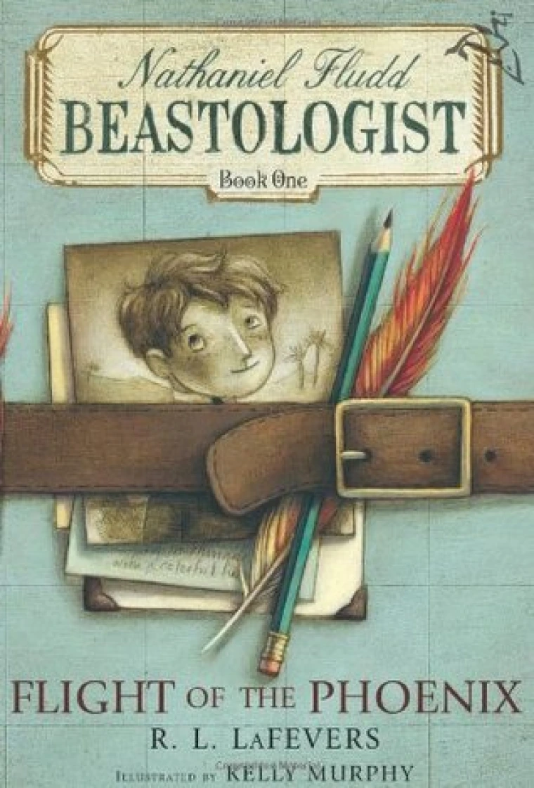 Picture of a young boy strapped to a journal with a pencil and orange feather.