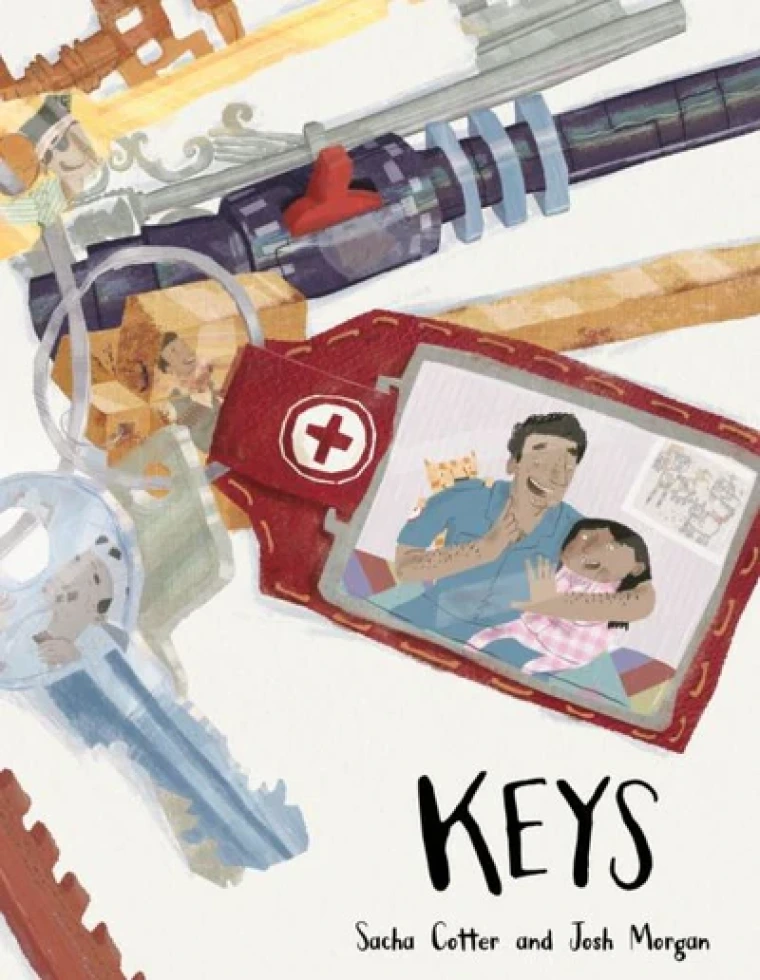 A picture of a dad and his daughter attached to a full key ring.