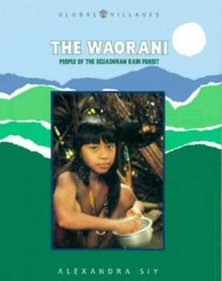 A yong Waorani girl looks at the camera.
