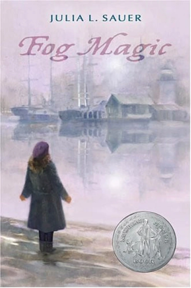 A woman is looking across a foggy riverside
