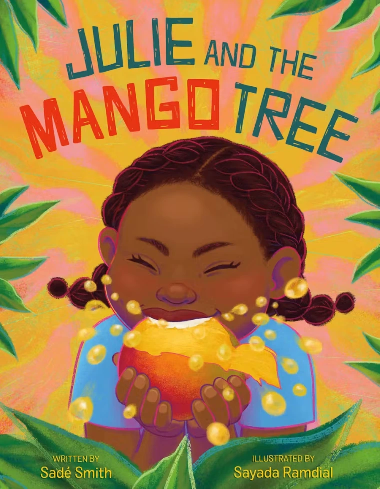 A young Black girl bites into a mango with great enthusiasm.