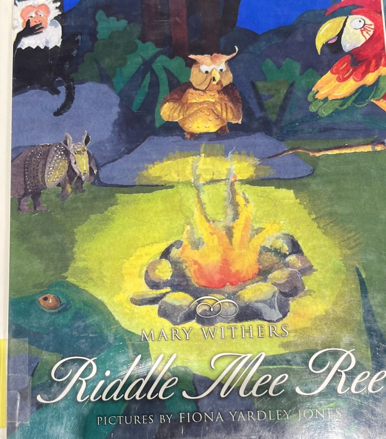 Tropical animals are huddled around a fire at night