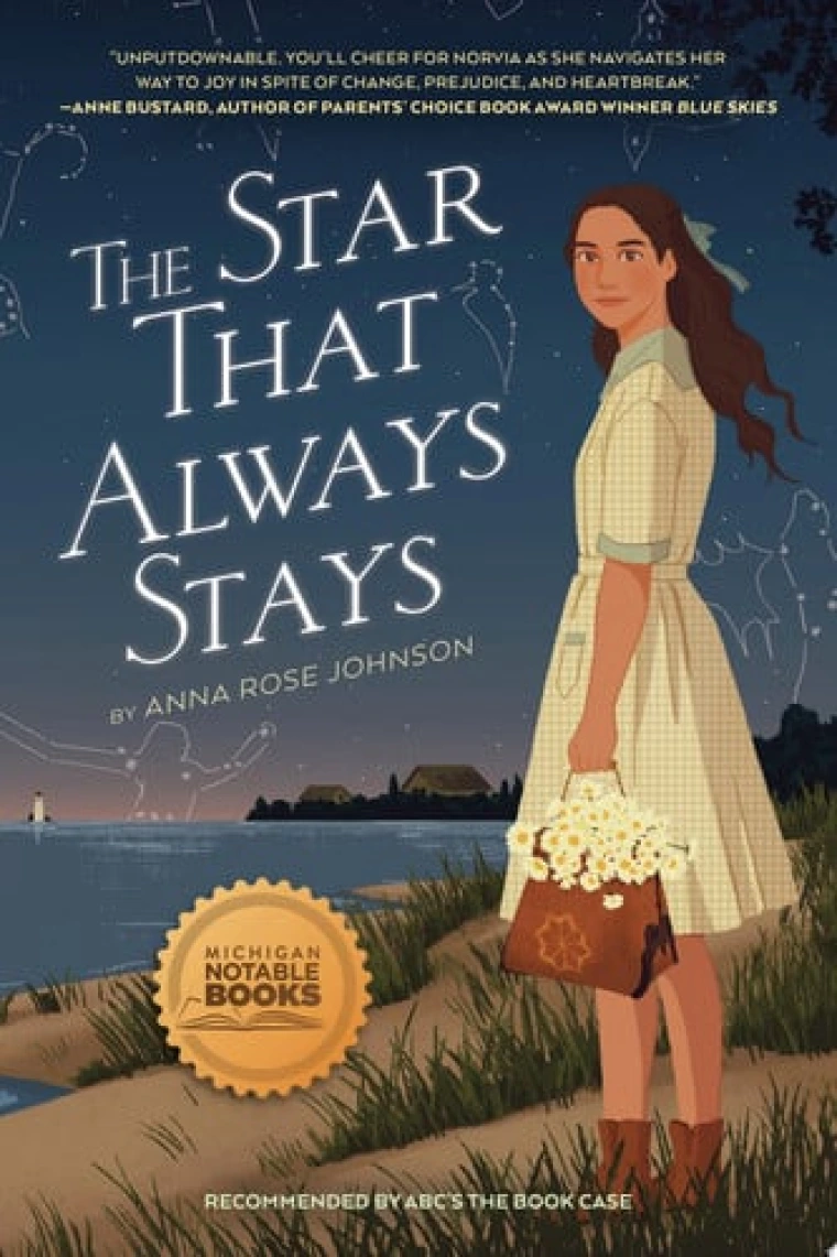 A girl in a long white dress is standing while behind her shows a view of the night sky and sea