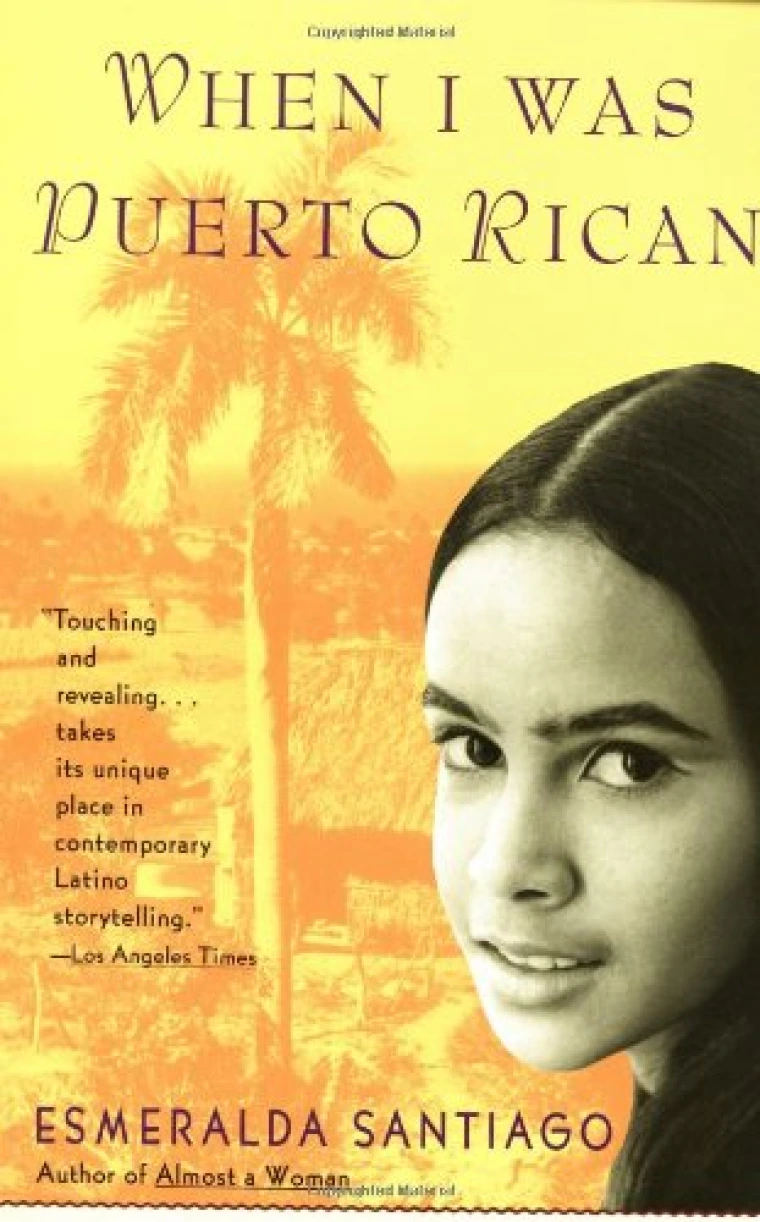Black and white photograph of a young girl's face in front of a faded orange picture of Puerto Rico.