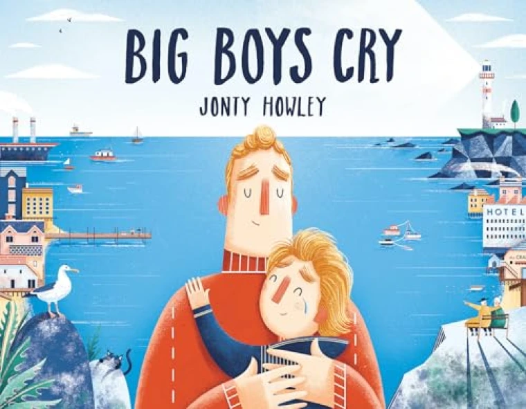 A man holds his crying son in front of a bay.