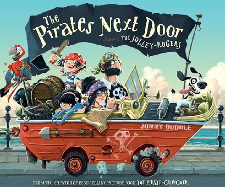 Pirates sit together in a small car made to look like a red boat.