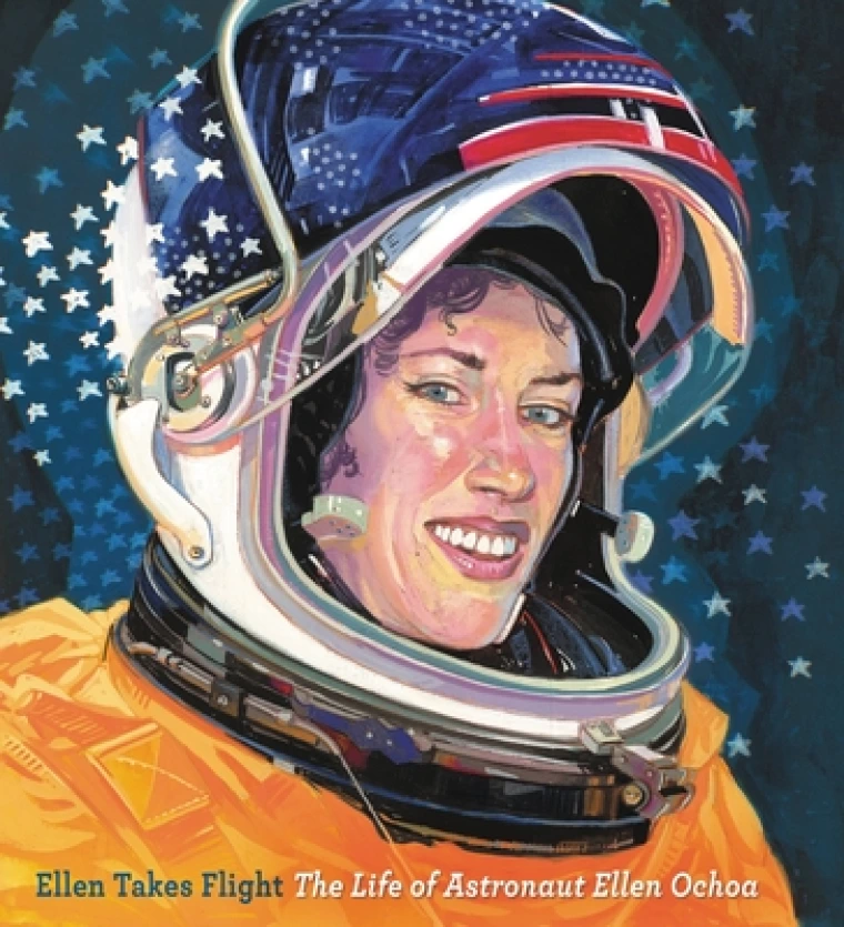 A smiling woman dressed in a bulky spacesuit