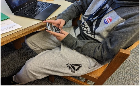 A Student Whose Profile Got to Vote Proudly Wears His Sticker
