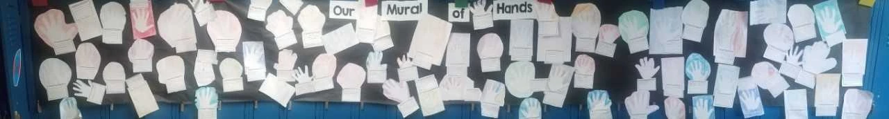 an interactive “Mural of Hands” in the hallway outside our classroom