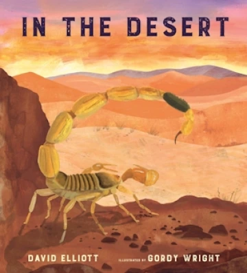 A scorpion looks out over the sandy desert.