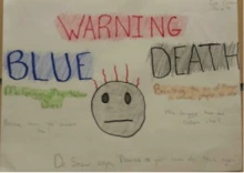 Cholera warning posters by seventh graders reading Outbreak.