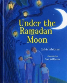 Cover of Under the Ramadan Moon depicting a family of four (a mother, father, a son and a daughter) looking up at a cresent moon in a blue sky, as they stand under a large tree with lights in it.