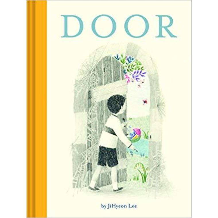 A boy opens a door covered in cobwebs