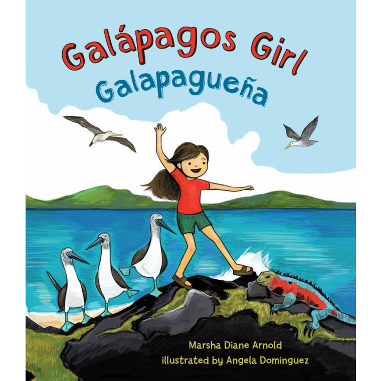 A girl clambers over a rocky beach