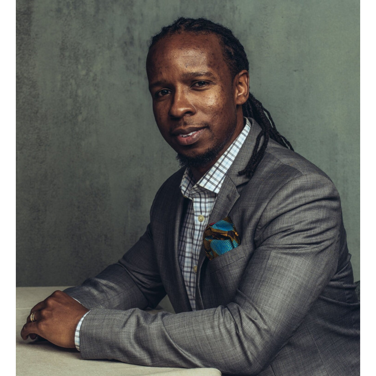 Well-dressed man with long locks