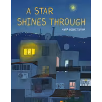 A city at night with apartment windows glowing.