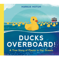 A yellow rubber duck floating in the ocean surrounded by many other rubber ducks.