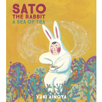 A man in a white rabbit suit stirs a cup of tea.