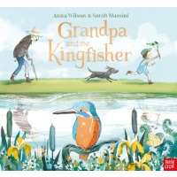 A grandfather walks behind a young boy and dog next to a lake.