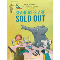 A boy sits at the dinner table with a seal, a fish, two birds, a mouse, a dog and an elephant. 