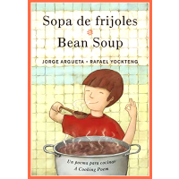 A child approvingly smells a large pot of bean soup.