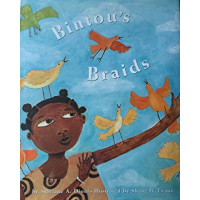A young Black girl holds out an arm that orange and yellow birds perch on.
