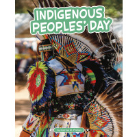 An Indigenous man in full regalia.