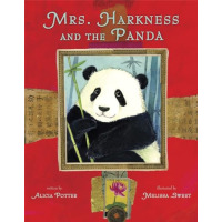 A panda holding bamboo.