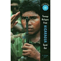 A boy in military garb salutes while holding a gun.