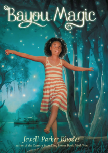 Young Black girl in striped dress stands at the water's edge