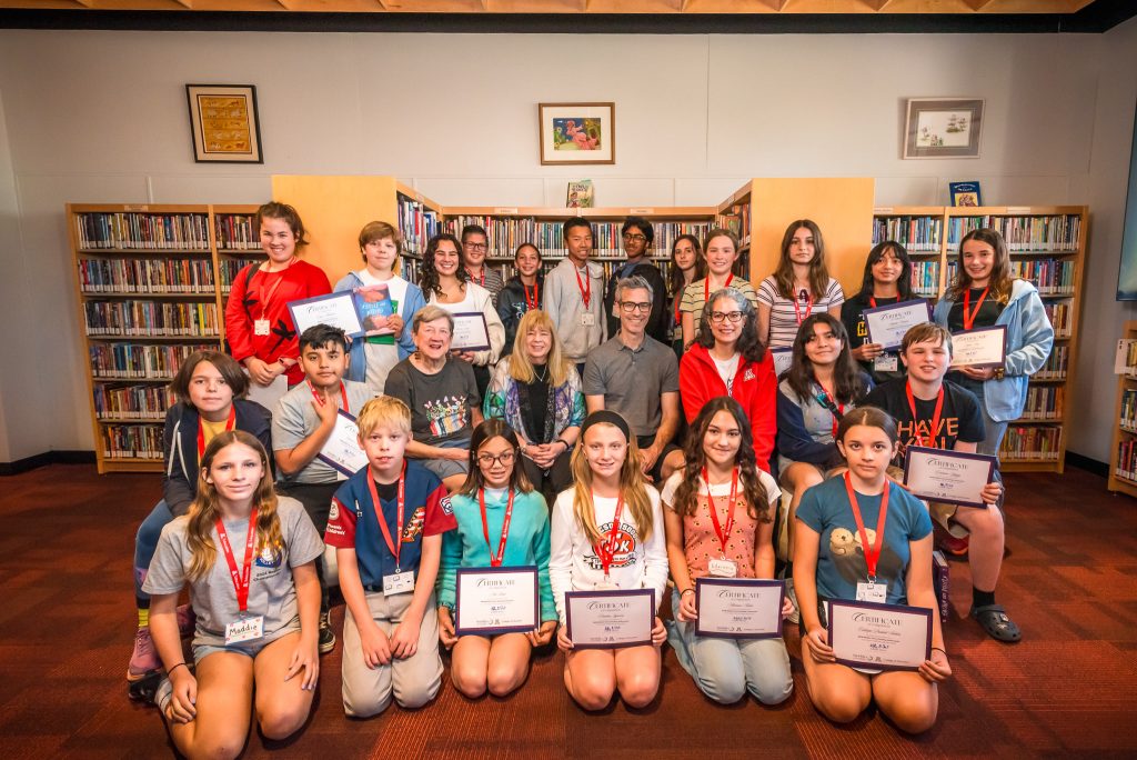 large group photo of reading ambassadors with certificates