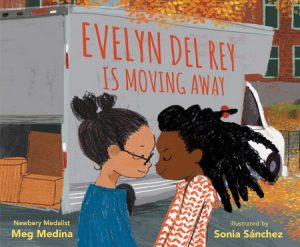 Cover of Evelyn del Rey is Moving Away depicting two young girls, one Hispanic and one Black, facing each other with smiles in front of a moving truck.