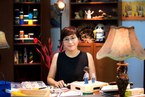 Heena Baek at her sculpting desk