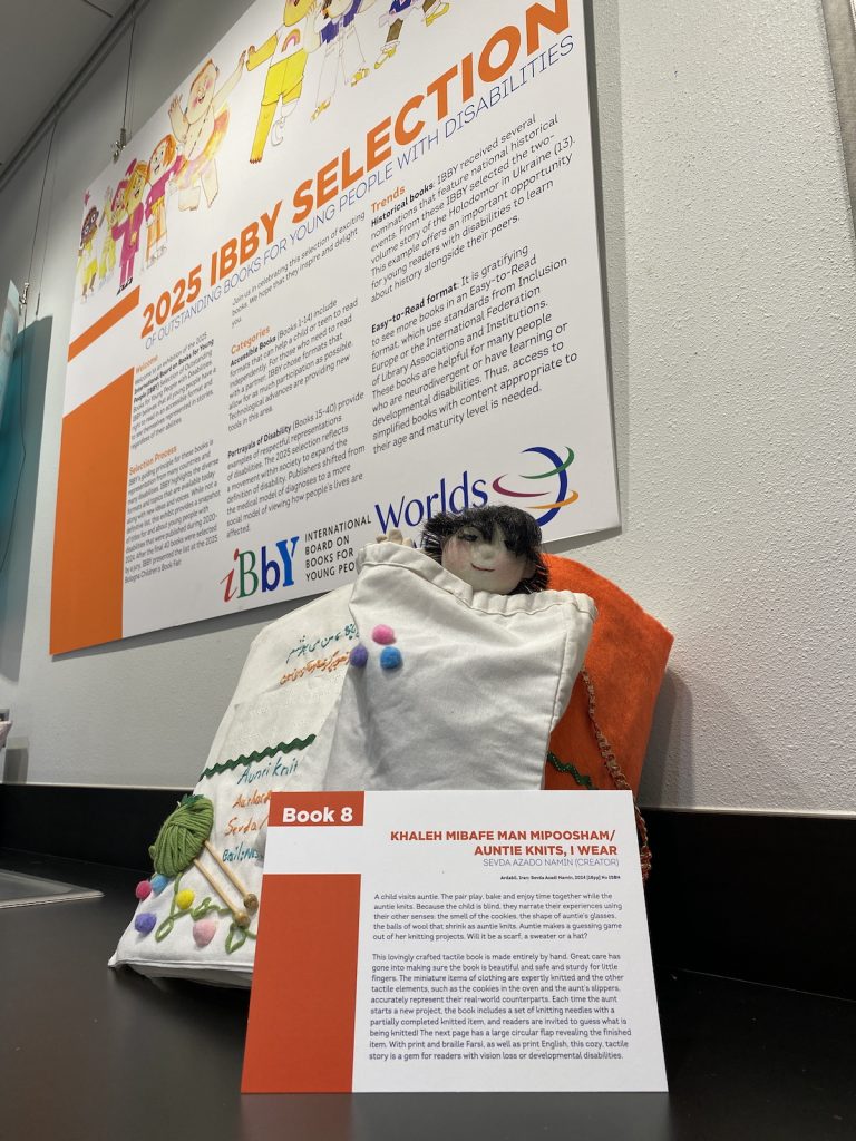 The adapted book Auntie Knits I Wear with signage for an exhibit