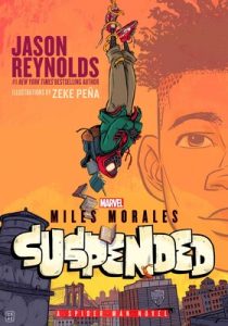 Miles Morales as Spiderman hangs over the New York skyline upside down while books fall out of his backpack.