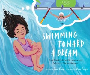 Girl in water dreaming of completing in Olympic swimming