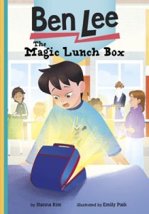 A boy startled by a lunchbox emitting a bright light